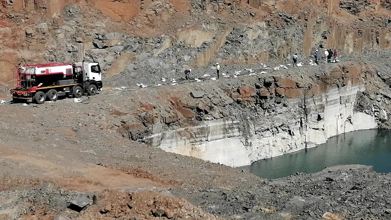 Quarry bench support activity with tanker and personnel