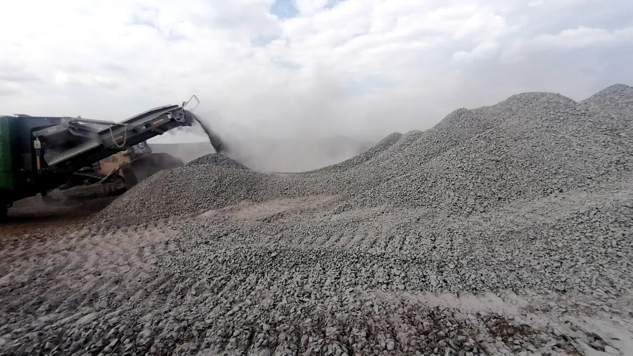 Processed aggregate stockpiles showing finished product texture
